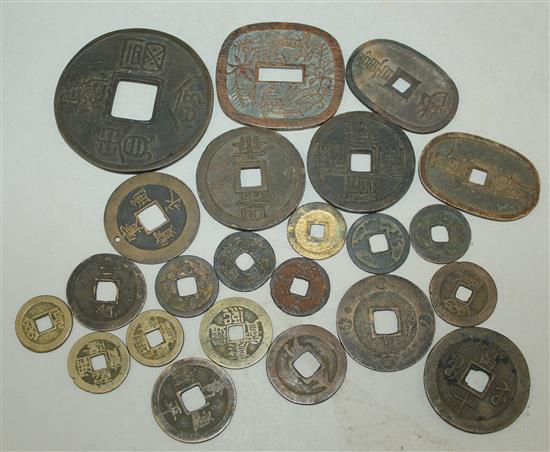 A collection of Japanese mon and half-shu coins and Chinese bronze and copper coins, 15th-19th century (23)